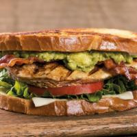 Sourdough Chicken Avocado · Stacked high with thick double smoked bacon, grilled chicken breast, hand smashed avocado, t...