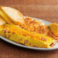 Ham And Cheese Omelet · A classic. Cooked to order, 3 hand-cracked eggs with smokehouse-cured ham and California che...