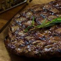 Grilled Rib Eye Steak (16 Oz.) · 20 oz ribeye steak, steak frites, chimichurri
