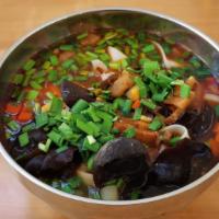 Qishan Noodle Soup 岐山臊子面 · Spicy and sour noodle soup with minced pork.