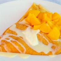 Signature Crepe 4 · Stuffed with cream cheese and banana. Topped with lechera (condensed milk), cream cheese and...