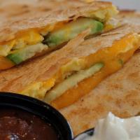 Breakfast Quesadilla · Egg, choice of chorizo, bacon or sausage and Jack cheese stuffed in a flour tortilla. Avocad...