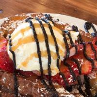 Challah French Toast · Popular. Housemade challah bread, strawberries, bananas, chocolate and caramel sauce, and wh...