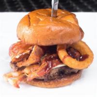 Bbq Bacon Cheeseburger · Prime rib steak burger with bacon, BBQ Sauce, lettuce, and Swiss_American cheese on a brioch...