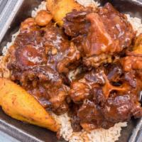 Oxtail Platter · Oxtails served with coconut scented rice and plantains
