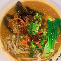 Tantan Men · Spicy level 1. Bean sprouts, carrots and spicy miso tofu. Served with baby bok choy, jicama,...
