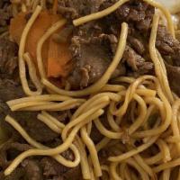Beef Chow Mein · Beef Chow Mein with cabbage, white onions, carrots, broccoli & zucchini.