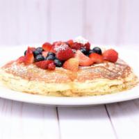 Buttermilk Pancakes · Fresh cut berries, butter, warmed maple syrup.