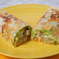 Chicken Wrap On The Grill · Grilled tortilla with chicken breast, avocado, cheese, sprouts, tomato, pepperoncini and onion