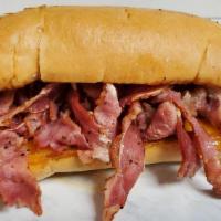Wtp - What The Pastrami Sandwich  · Grilled pastrami, on a toasted hogie roll, with melted Monterey Jack and cheddar cheese.