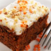 Classic Carrot Cake · Our perfectly moist and flavorful carrot cake with walnuts and vegan cream cheese frosting.