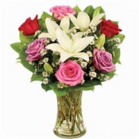 Rose & Lily Romance Bouquet · When is the last time you literally swept your special someone off their feet? This romantic...