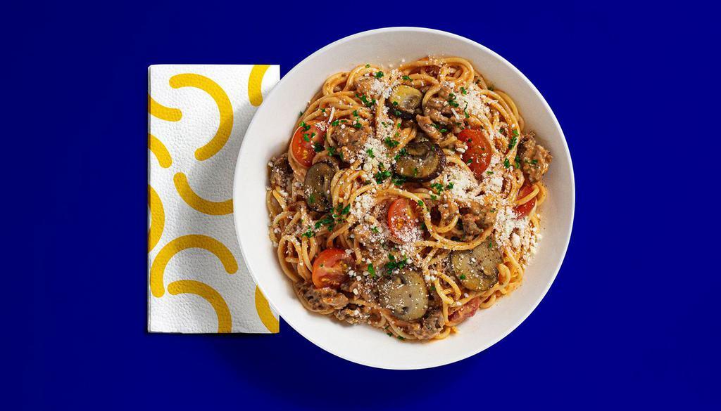 House Spaghetti · Spaghetti with tomato cream sauce, Italian sausage, mushrooms, cherry tomatoes, fresh parsley, parmesan