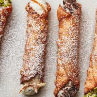 Cannoli · Fried pastry dough stuffed with pastry cream.