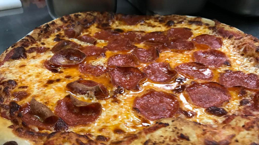 Pepperoni   Pizza · Mozzarella Cheese, sliced pepperoni, and marinara sauce.