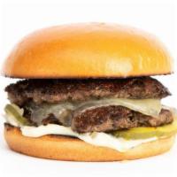 The Truffle Burger · Smashed double patties, dashi onions, truffle provolone cheese, pickle chips, truffle mayo o...