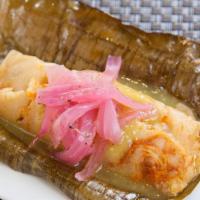 Tamales Salvadoreno · Chicken, olives, potatoes and serrano avocado cream.