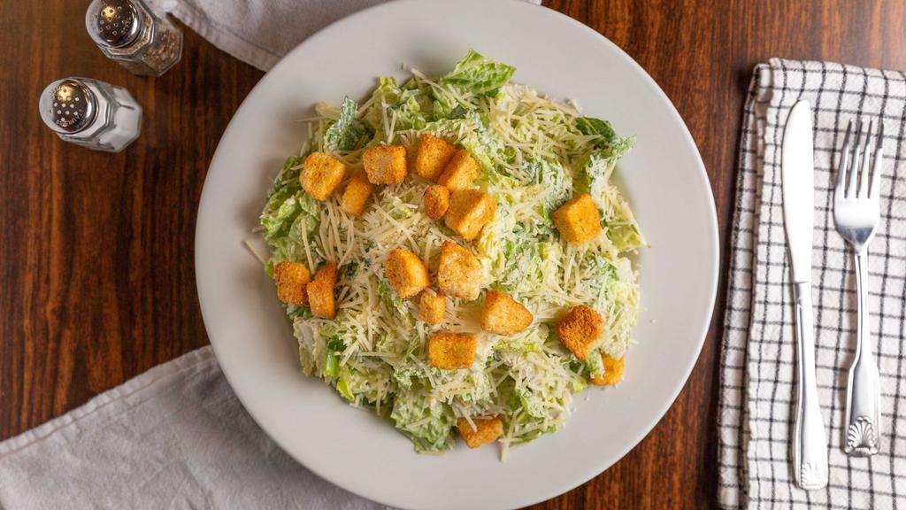 Caesar Salad · Romaine, homemade croutons, and fresh Parmesan tossed with a homemade Caesar.