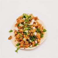 Chicken Taco · Marinated Grilled Chicken Breast, Cilantro, onion, and salsa verde.