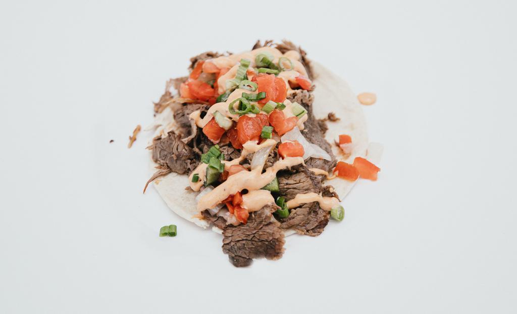 House Special Taco · Top-sirloin Roast Beef, grilled onions, scallions, house salsa, and chipotle aioli.