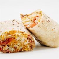 Breakfast Burrito · Eggs, tater tots, chipotle aioli, cheddar cheese, and house salsa.