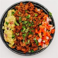 Al Pastor Bowl · Marinated Grilled Al pastor, Spanish Rice, Pinto Beans, Lettuce, House salsa, Guacamole, and...