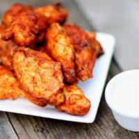 5 Pieces - Chicken Wings · Bone-in, Buffalo-style wings seasoned with a sauce, and BAKED.
