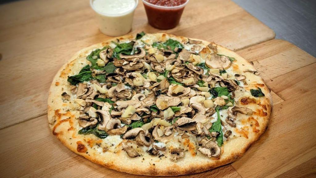 Tuscan #13 Small · Creamy white garlic sauce, mozzarella and Monterey Jack cheese blend, topped with fresh spinach, mushrooms, and roasted garlic. Add roasted seasoned chicken breast at no extra charge.