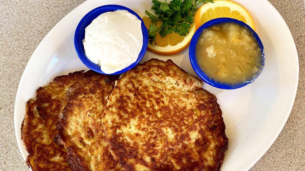 Potato Latkes (3) · Potato pancakes. Served with sour cream or  applesauce.