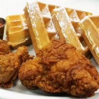 Fried Chicken & Waffles · Choice of: 3 pieces of Honey Battered
Crispy Fried Chicken or 4 Chicken Strips
accompanied b...