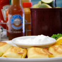 Blintzes (4) · Our very own. Blueberry, cheese, or cherry cheese. Served with sour cream and preserves.