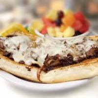 Philadelphia Style Steak Sandwich Sandwich · Thin sliced steak grilled with onions and topped with provolone cheese and served on a frenc...