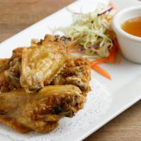 Classic Fried Chicken Wings · Deep fried chicken wings, Served with Sweet chili sauce
