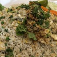 Scramble Egg Crab Meat Fried Rice · Fried rice with crab meat, egg, green onion, peas, cucumber, carrot, lime and cilantro