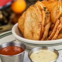 Thick Chips · Kennebec potatoes, chile rub, ketchup