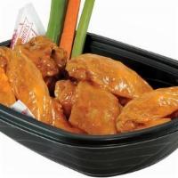 Bone-In Wings - Small (6 Pcs) · A sampling of six of our world famous fresh, never frozen Buffalo’s chicken wings and drumet...