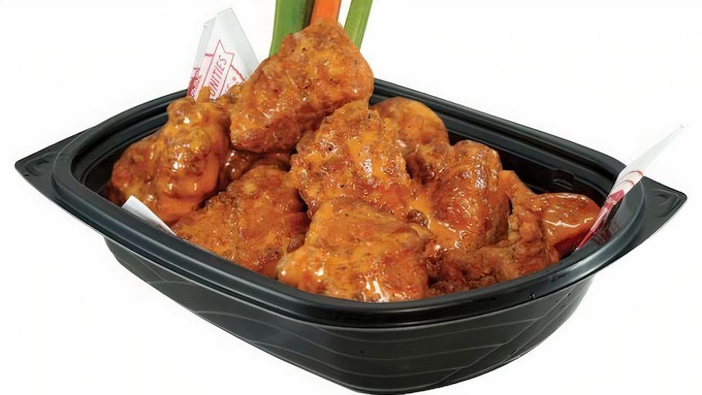 Boneless Wings - Medium (10 Pcs) · A portion of ten of our world famous fresh, never frozen Buffalo’s boneless chicken wings. Served with carrots & celery and your choice of honey mustard, ranch or blue cheese dressing.