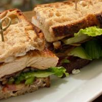 Roasted Chicken Breast Sandwich · Tomatoes, cucumbers, green bell peppers, lettuce, pickles, grilled onions,goat cheese, lemon...