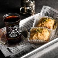 Baklava · Rich, sweet dessert pastry made of layers of filo filled with chopped nuts, topped with pist...