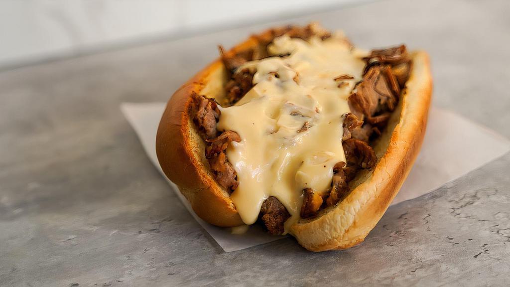 Classic Philly Cheesesteak · Classic 8” Philly cheesesteak loaded with grilled steak and melted cheese on a toasted hoagie roll