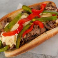 Philly King Grilled Pepper Cheesesteak · 8” Philly cheesesteak loaded with grilled steak, melted cheese and grilled bell peppers on a...
