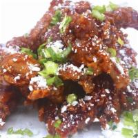 Chipotle Honey Tenders · Chipotle honey glaze, cotija cheese, scallions. Served with miso ranch or blue cheese.