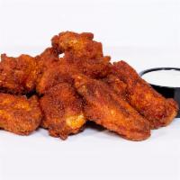 Nashville Hot Wings · Nashville style fried chicken wings; served with miso ranch, includes 6 wings.