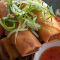 Egg Rolls · Pork and vegetable filling, sweet chile dipping sauce.