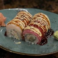 Rainbow Roll  · Crab Mix / Shrimp Tempura / Avocado / Topped with Tuna, Scallop, & Salmon