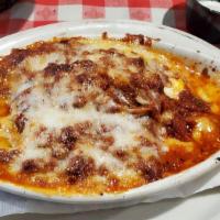 Earl'S Lasagna · Baked, housemade meat sauce, four cheese blend.