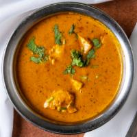 Chicken Tikka Masala · Boneless chicken roasted in a clay oven, finished with a delicious blend of creamed tomato c...