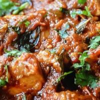 Lamb Rogan Josh · Boneless lamb cooked with a curry sauce of onions, garlic, ginger, tomatoes, and almonds. Se...