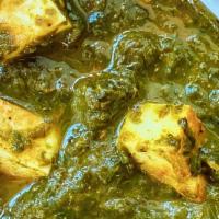Palak Paneer (Saag) · A healthy blend of spinach, broccoli, garlic, ginger, onions exotic spices, and cubed farmer...