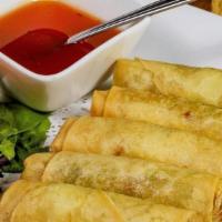 Crispy Rolls · Fried spring rolls with glass noodles, cabbage, carrots, and taro served with sweet and sour...